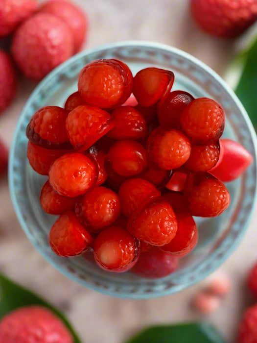 Peelable Lychee gummies in a bowl